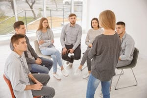 Therapist leading a session of evidence based treatment