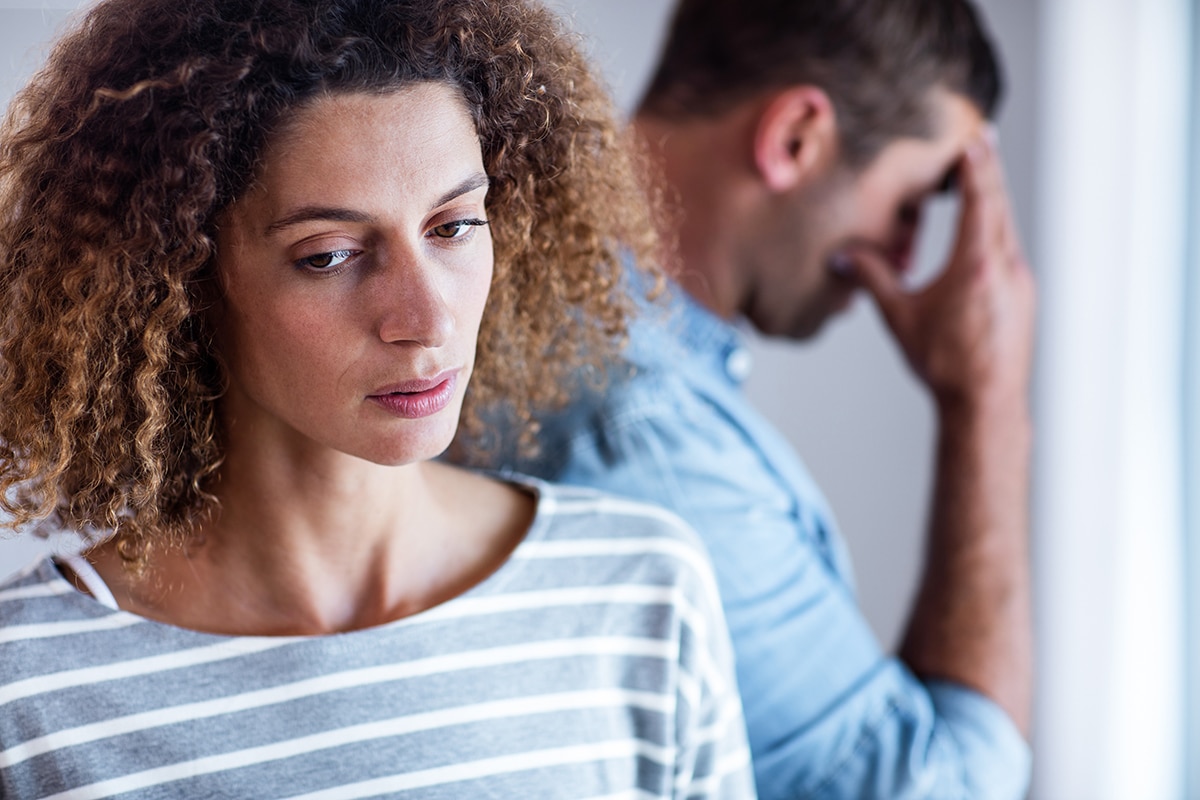 woman unsure of how to help Loved One With Depression in background