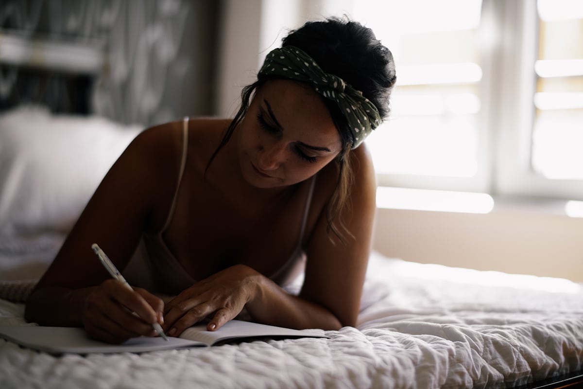 woman writing down her new relapse prevention plan