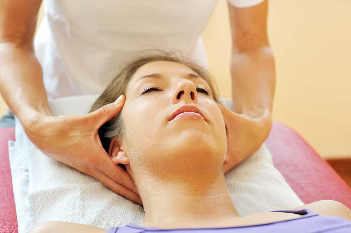 patient getting holistic treatment massage