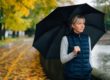 woman outside in rain dealing with seasonal depression