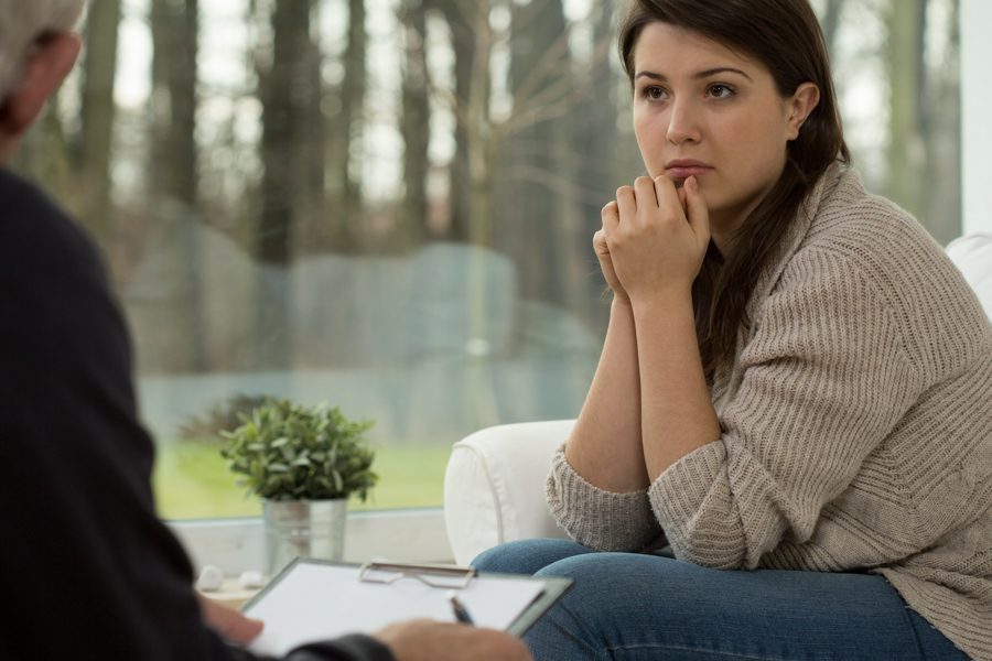 couple in therapy addressing emotional struggles from divorce and addiction