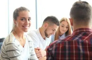 Woman enjoys her meeting with the addiction treatment staff