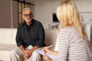 man attending therapy to treat alcoholism