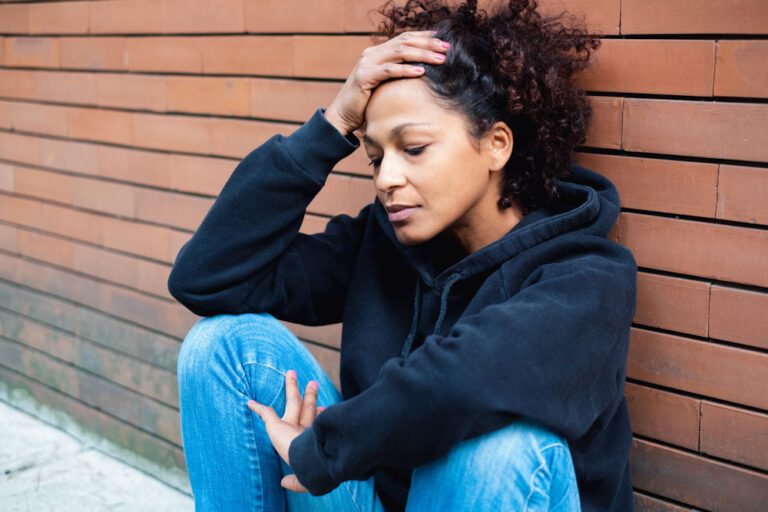 girl suffering from kratom addiction wondering how long it stays in her system