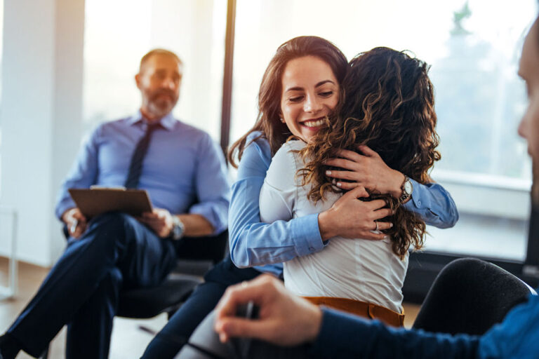 group discussing oxycontin addiction treatment program together