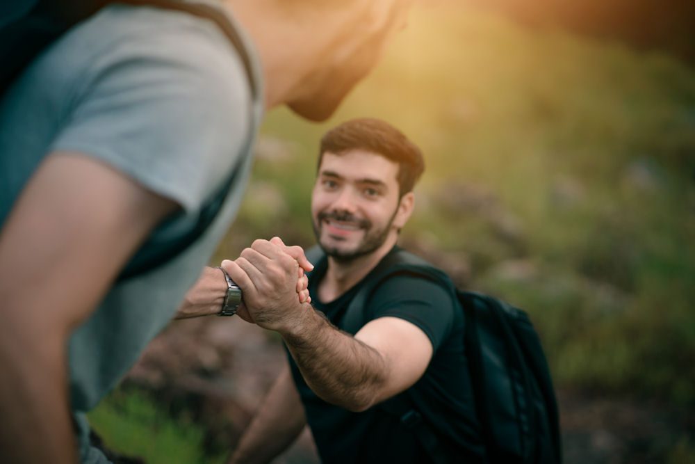 Recovery mentor guiding individual during addiction recovery